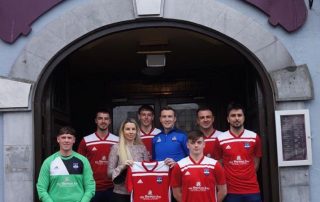 Teresa Devaney of the Broken Jug Bar and Restaurant in the Heart of Ballina presenting the new Ballina Town B team kit for 2019 to team manager Mark Beattie.